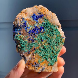 Azurite and Malachite are two copper carbonates that often grown together. Here they are growing in matrix. We love how each of these pieces look like little worlds with blue oceans of Azurite and green forests of Malachite! 🌎🌍🌏