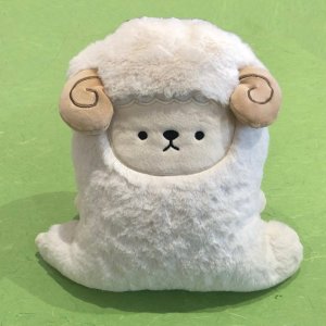 Stuffed sheep plush doubles as a blanket! Unzip from the fluffy tail to pull out a super soft blanket. Also comes in dog and cat form. In store only.
