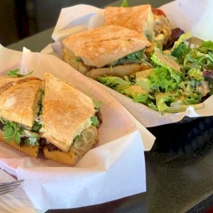 Our Beetloaf Sandwich is a lunch fave! Served warm on soft filone wth aged Gouda, house made mayonnaise, arugula, red onion and dijon mustard. (Contains cashews, pine nuts and sunflower seeds.) $11.50